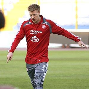 Denmark's Bendtner expected to miss opener