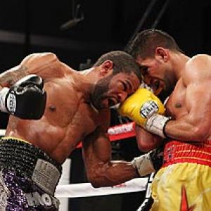 Amir Khan loses titles to Peterson