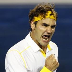 Federer survives scare from bogeyman Simon
