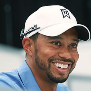 Injured Woods unsure about playing in British Open