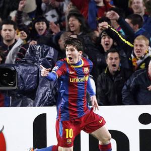 CL Images: Messi mauls Arsenal as Barca go through