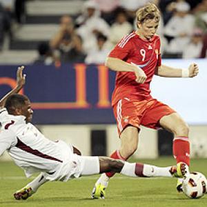 Russia's Pavlyuchenko salvages 1-1 draw in Qatar