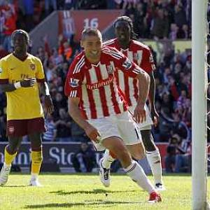 Arsenal's title hopes end with defeat at Stoke