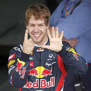 Vettel takes record pole in Brazil