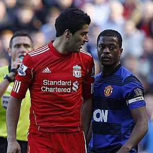 Man U's Evra claims of racist abuse by Suarez