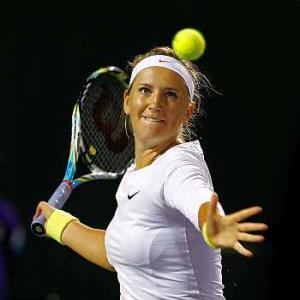 Azarenka advances in Stuttgart, Wozniacki out