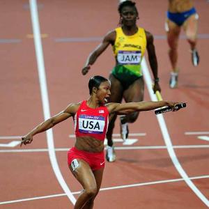 PHOTOS: US breaks 27-year-old record in women's 4x100