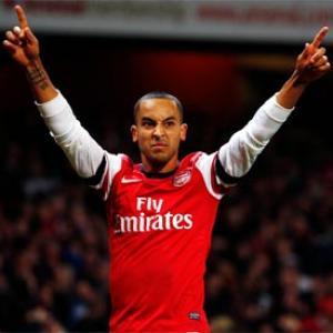 Shades of Henry as Walcott fires Arsenal hat-trick