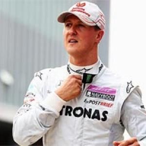 Schumacher plays down title chances