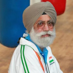 Boxing coach Sandhu to retire after London Olympics