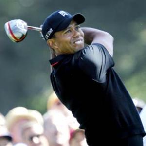 Tiger toils at Olympic, slips five off the pace