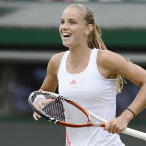 Wimbledon Images: Stosur, Wozniacki suffer shock defeats