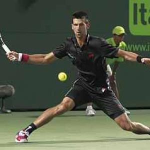 Djokovic beats Monaco to set up Murray final