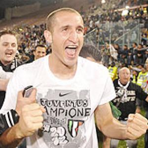Juventus claim Serie A crown after AC lose Milan derby