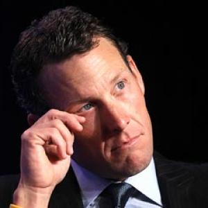 Armstrong banned for life, loses Tour de France titles