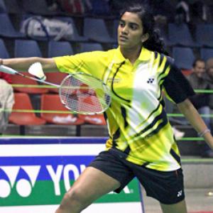 Saina, Sindhu in third round of World badminton; Kona-Vishnu exit