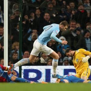 EPL: City go top with tough win over Palace