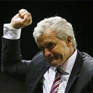 Stoke manager Hughes charged with improper conduct