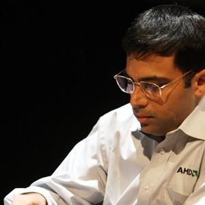 Anand held by Caruana; slips to joint third