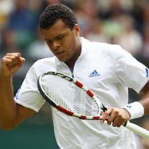 Tsonga saves five match points to knock out Tomic