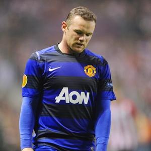 Rooney return from knee injury delayed
