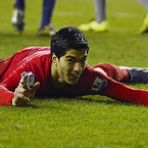 Liverpool's 'trickster' Suarez tops EPL scoring charts