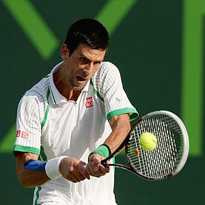 Djokovic breezes past Somdev at windy Miami