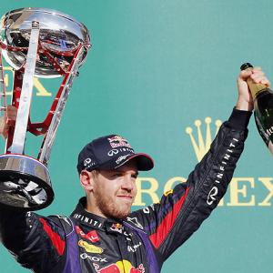 PHOTOS: Vettel vrooms to record with U.S. Grand Prix win