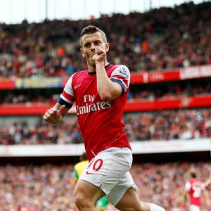 EPL PHOTOS: Superb Wilshere puts Arsenal back on top of table