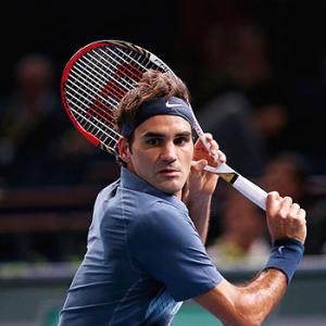 Federer advances in Paris; books 12th Tour Finals spot