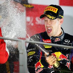 Formula One: Vettel cruises to Singapore treble