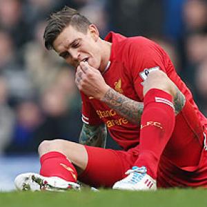 Injured Agger sidelined for up to a month