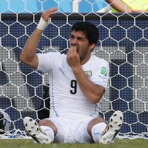 Suarez's bite gets him four months ban from football