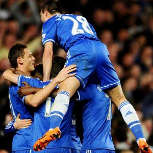 EPL PHOTOS: Chelsea surge clear with Tottenham drubbing; United demolish West Brom
