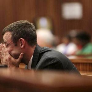 Pistorius vomits in court at Steenkamp autopsy details