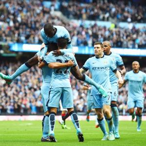 Soccer Roundup: Aguero sizzles for City in derby; Barca lose again