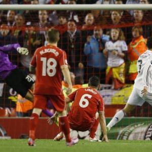 Ronaldo leads rout as Real outclass Liverpool