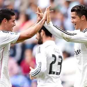 La Liga: Ronaldo treble as Real hit eight, Atletico held