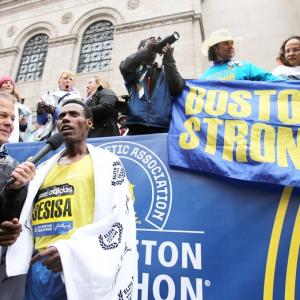 Africans rule but 'Strong Boston' echoes two years after bombing