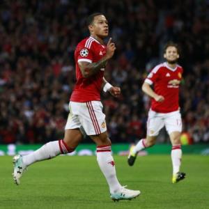 Old Trafford in seventh heaven as Memphis makes mark in iconic jersey