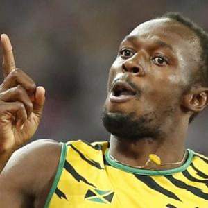Bolt completes 100-200m double at Worlds