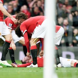 EPL PHOTOS: Rooney is a knockout for United