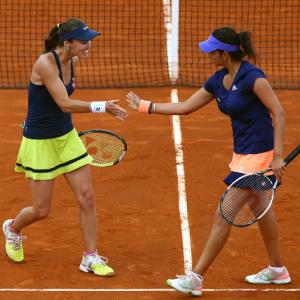 Saina, Paes, Bopanna advance in doubles at French Open
