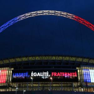 PHOTOS: At soccer match with France, British PM to lead show of solidarity