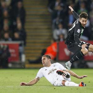 EPL PHOTOS: Krikic penalty gives Stoke victory at Swansea