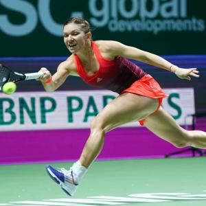 WTA Finals: Halep storms to victory in opener