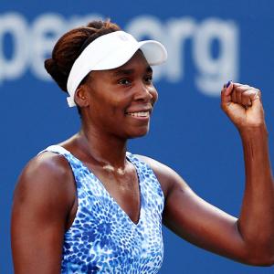US Open PHOTOS: Venus, Serena set up quarters clash; Djokovic stretched