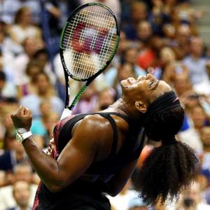 Serena trumps sister Venus to keep calendar Slam on track
