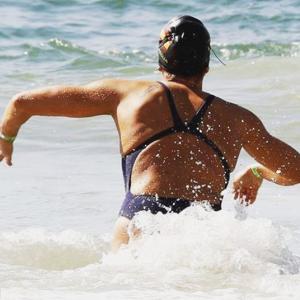 Spanish marathoner swimmer mingles with crowd at Copacabana