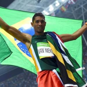 Van Niekerk breaks world record to win 400 gold